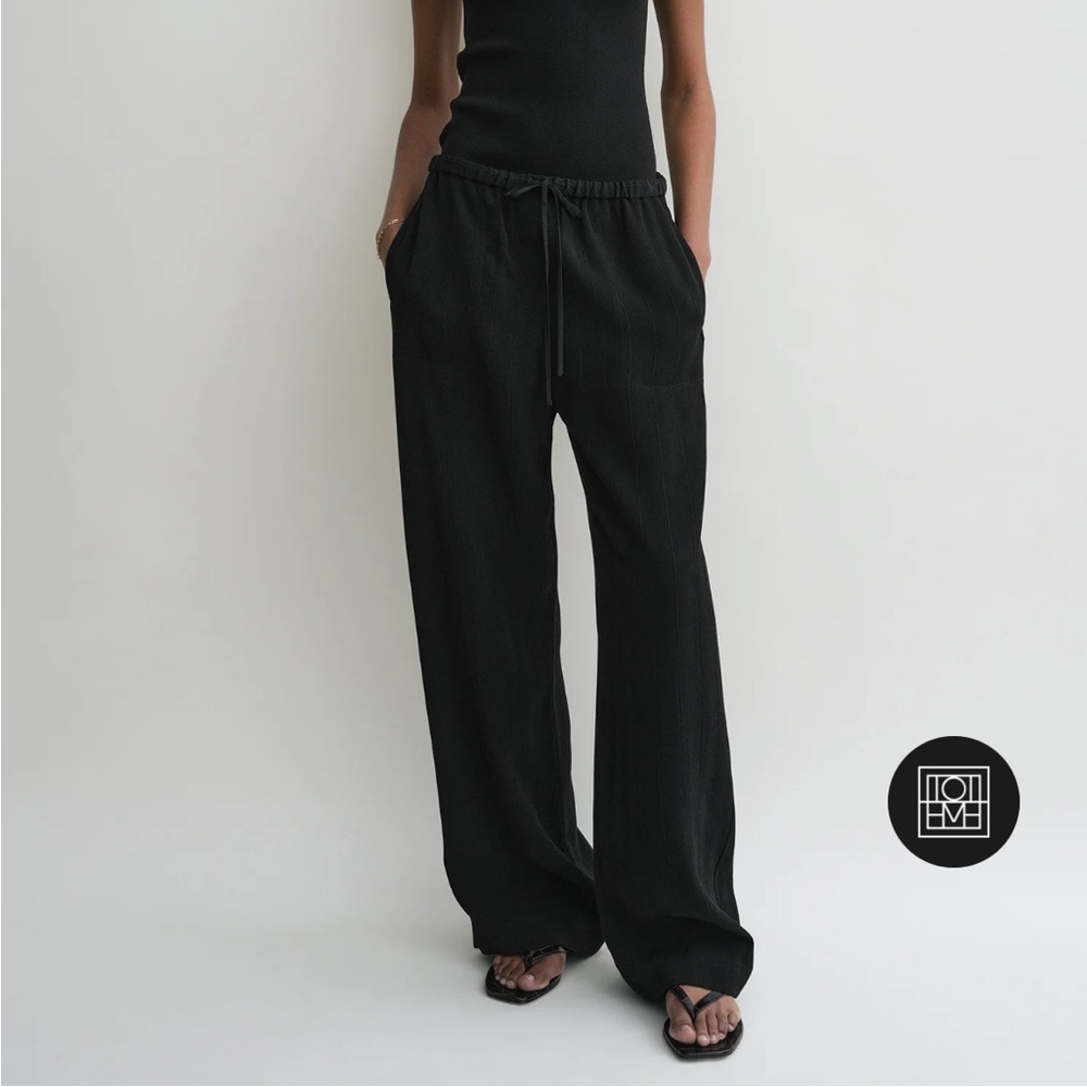 Toteme Woven Stripe Drawstring Trousers in Black